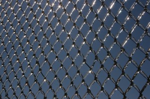 icy chain link fence by existentist