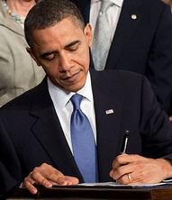 Barack Obama signing the Patient Protection an...